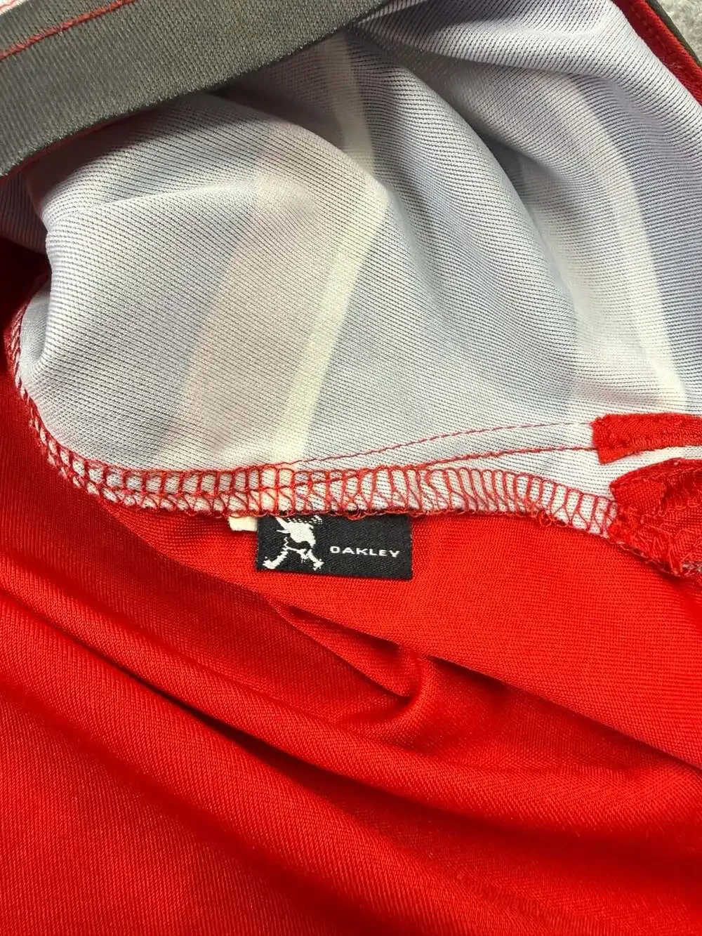 Oakley Polo Shirt Size XL Red Striped Golf Short Sleeve